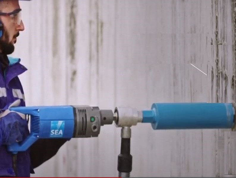 How to make a hole in reinforced concrete with a core drill